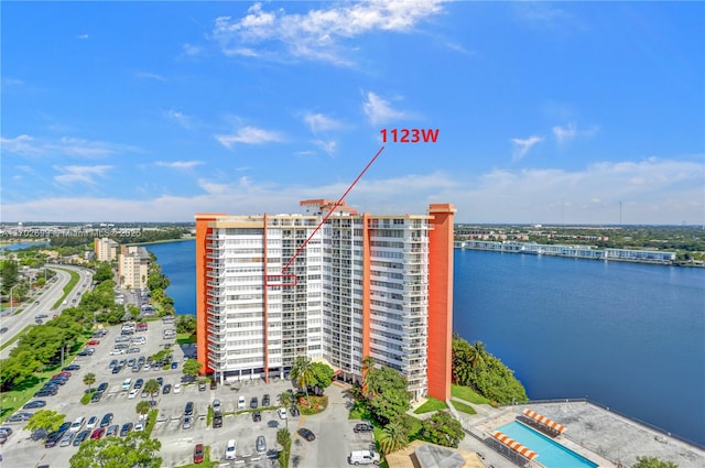 birds eye view of property featuring a water view