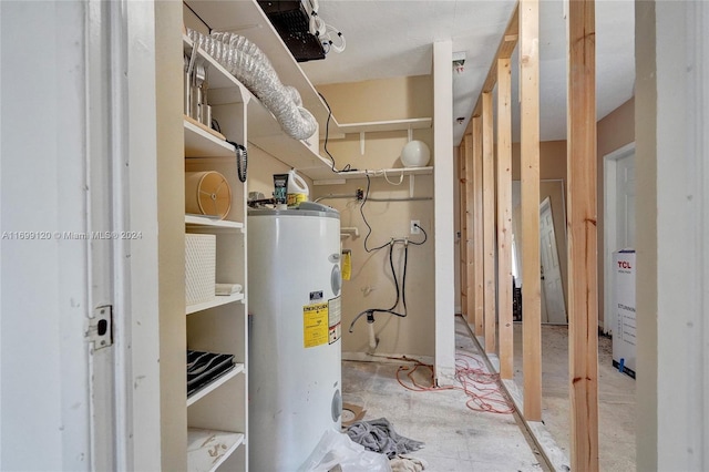 utility room with electric water heater