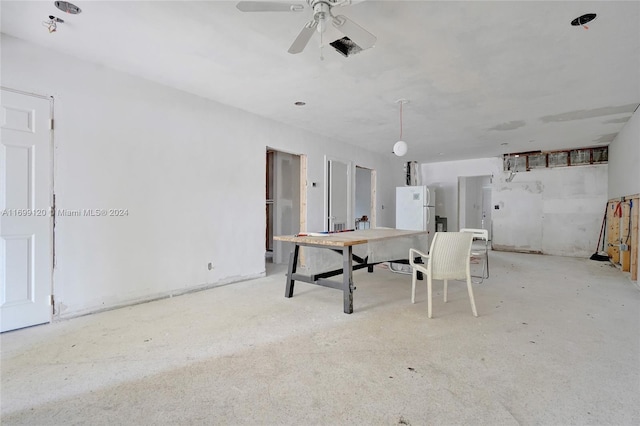 unfurnished dining area featuring ceiling fan