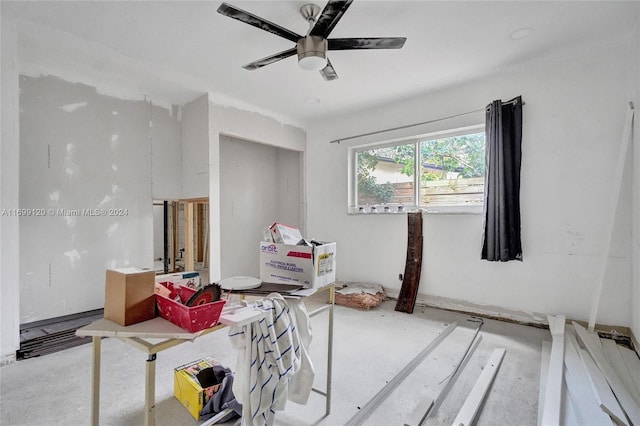 interior space featuring ceiling fan