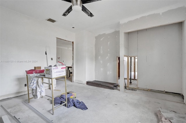 interior space featuring ceiling fan