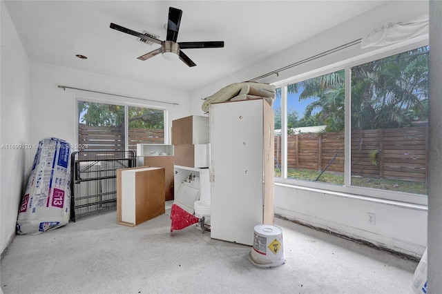 interior space featuring ceiling fan