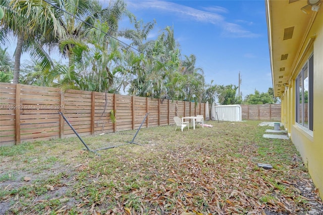 view of yard with a shed