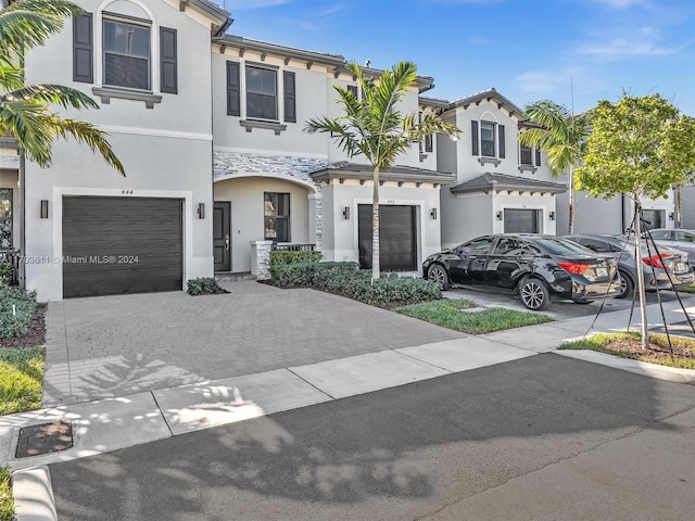 view of front of home with a garage