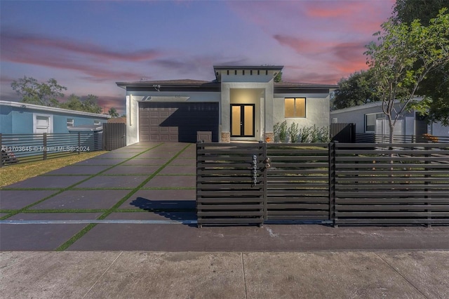 view of front of home with a garage