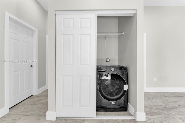 laundry room featuring washer / clothes dryer