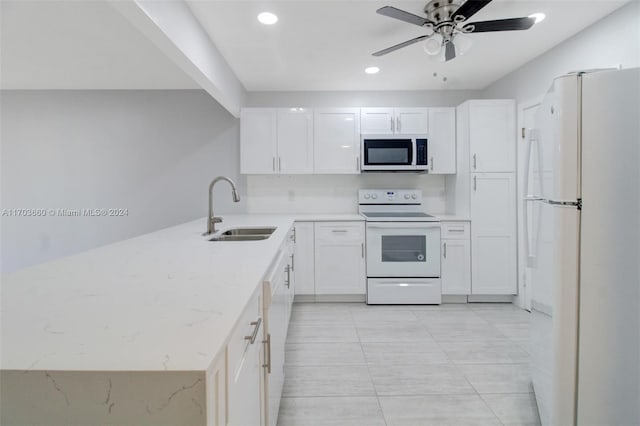 2251 NW 48th Ter Unit 208, Lauderhill, FL 33313 - kitchen with white appliances, a sink, recessed lighting, white cabinets, and a ceiling fan