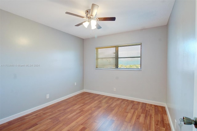 2251 NW 48th Ter Unit 208, Lauderhill, FL 33313 - spare room featuring light wood-type flooring, a ceiling fan, and baseboards