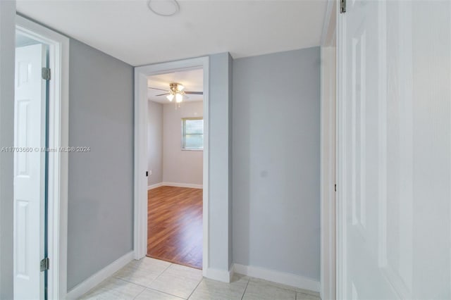 2251 NW 48th Ter Unit 208, Lauderhill, FL 33313 - corridor featuring baseboards and light tile patterned floors