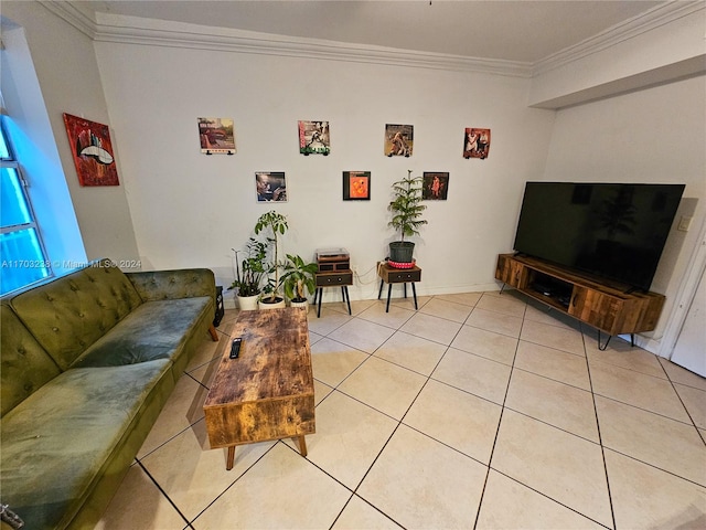 living room featuring light tile patterned flooring and ornamental molding