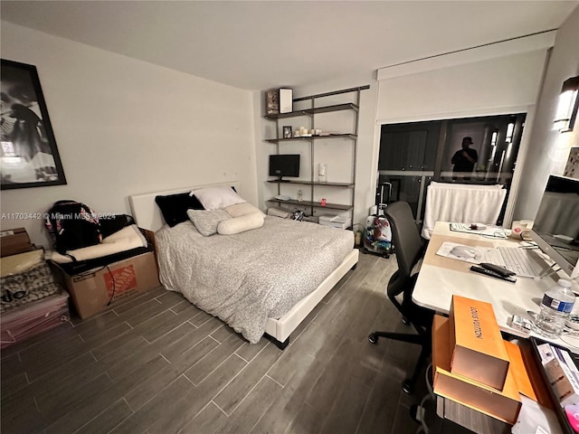 bedroom featuring dark hardwood / wood-style floors