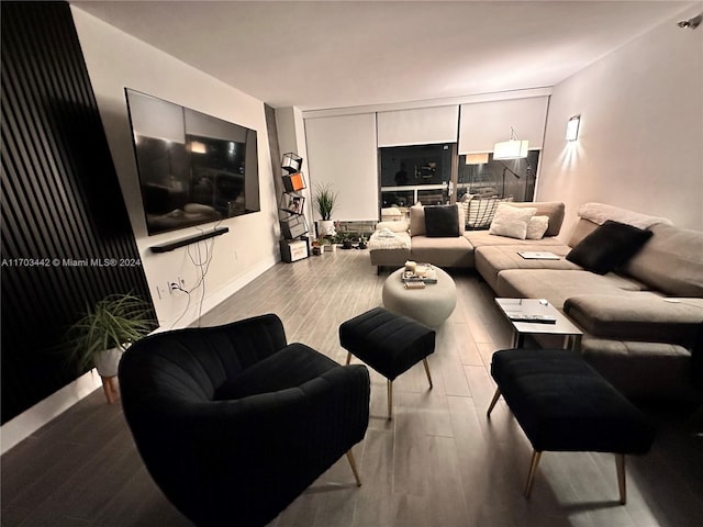 living room with light hardwood / wood-style flooring