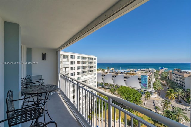 balcony featuring a water view