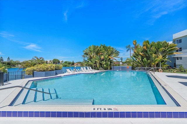 view of swimming pool featuring a patio