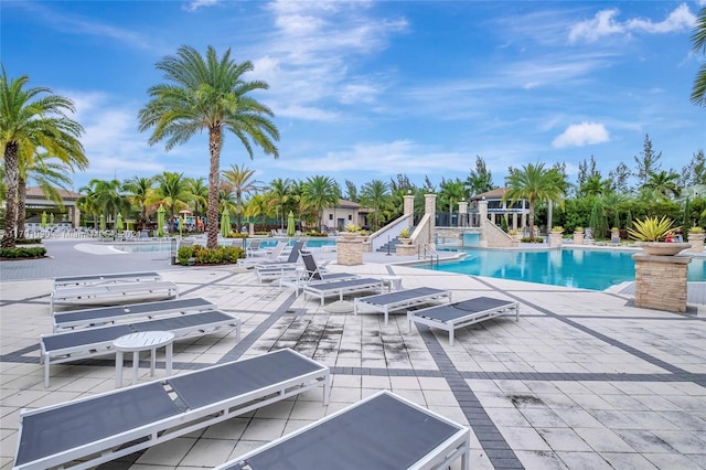 view of swimming pool with a patio area