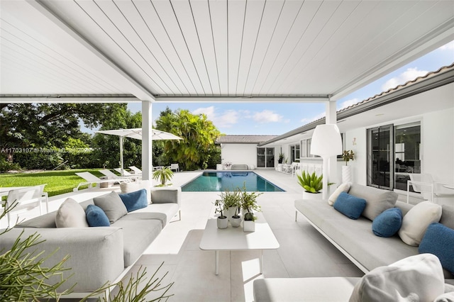 view of pool featuring an outdoor hangout area and a patio