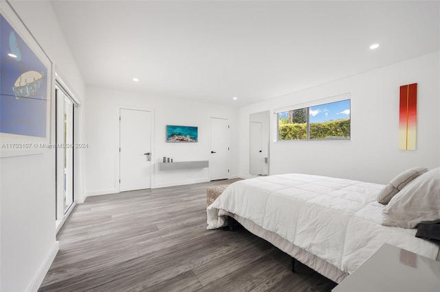 bedroom featuring hardwood / wood-style flooring