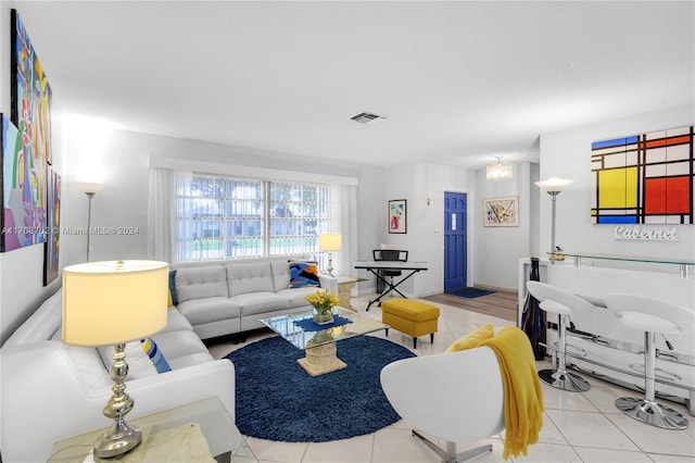 living room with light tile patterned flooring