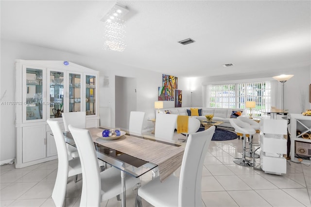 dining room with light tile patterned floors