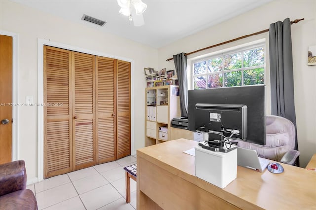 office with light tile patterned flooring