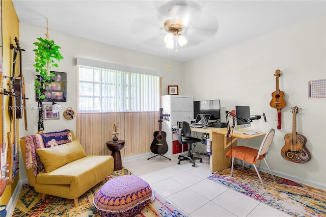 tiled office space with ceiling fan