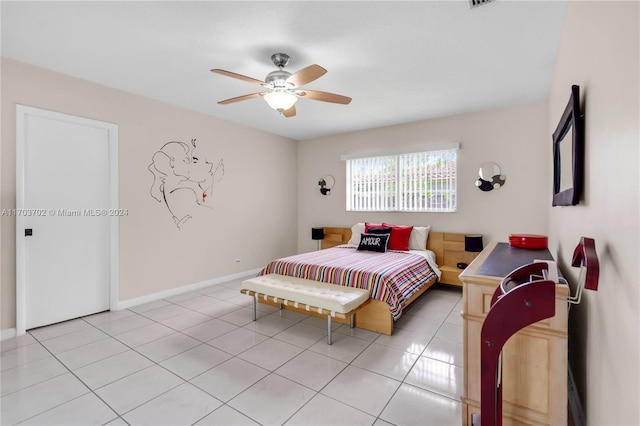 bedroom with ceiling fan and light tile patterned floors