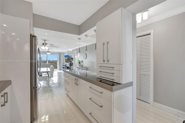 interior space with ceiling fan and light tile patterned flooring