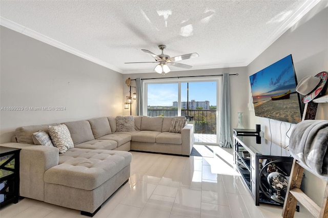 tiled living room with a textured ceiling, ceiling fan, and crown molding