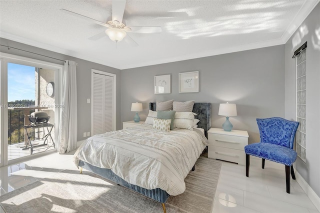 bedroom featuring a textured ceiling, ceiling fan, access to exterior, ornamental molding, and a closet