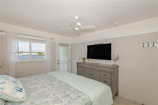 bedroom featuring access to exterior and ceiling fan