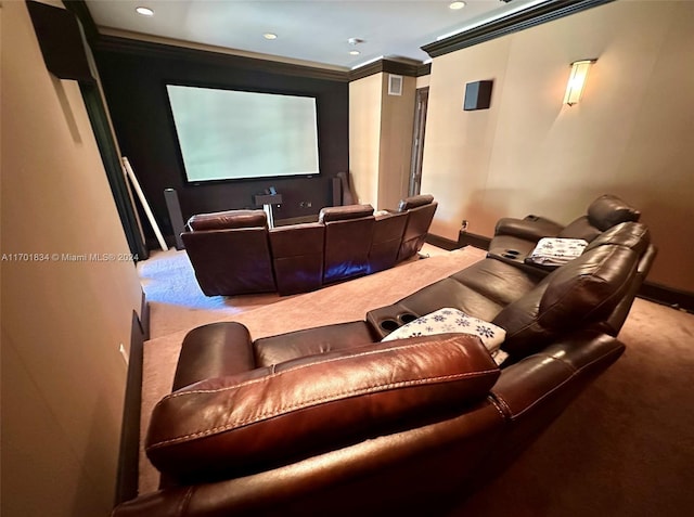 home theater featuring carpet flooring and ornamental molding