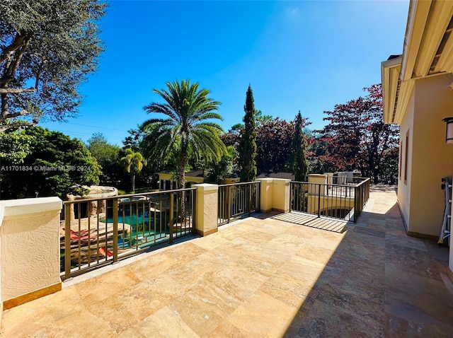 view of patio / terrace featuring a balcony