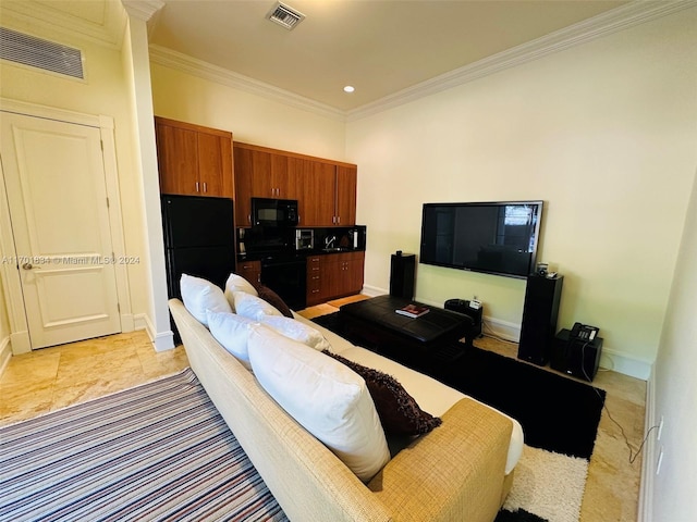 living room with ornamental molding