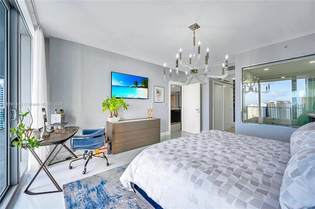 bedroom featuring an inviting chandelier