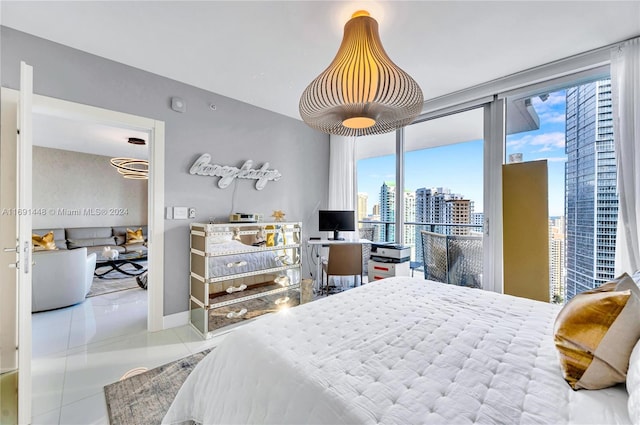 bedroom featuring tile patterned floors and multiple windows