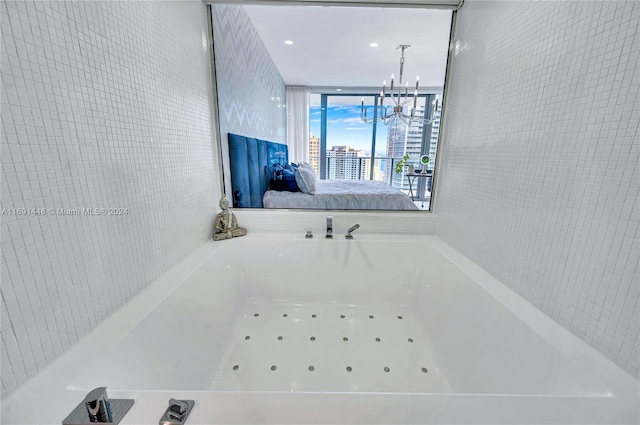 bathroom with a chandelier