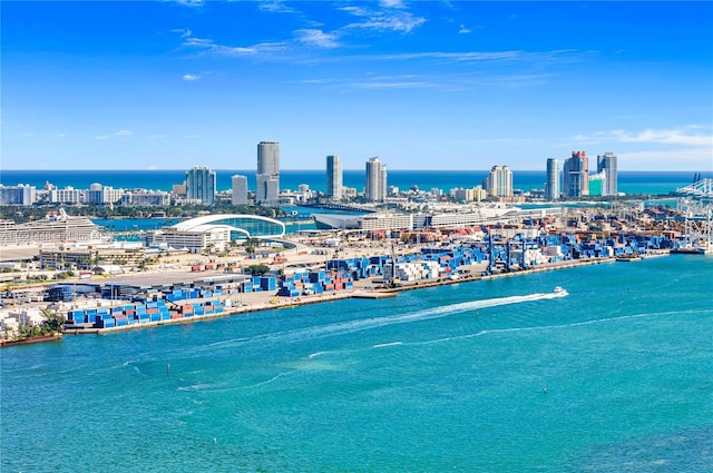 birds eye view of property featuring a water view