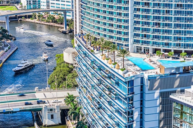 birds eye view of property featuring a water view