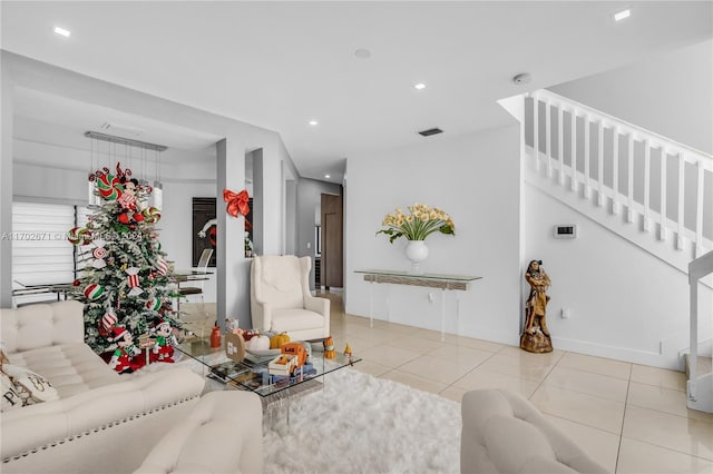 living room featuring light tile patterned flooring