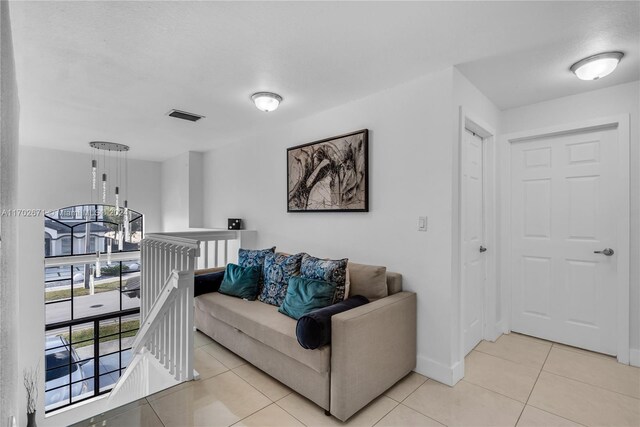 living room featuring light tile patterned floors