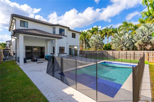 view of swimming pool featuring a patio area