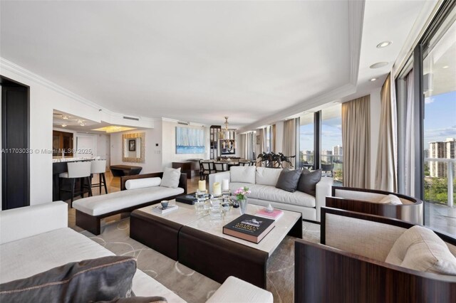 living room featuring floor to ceiling windows