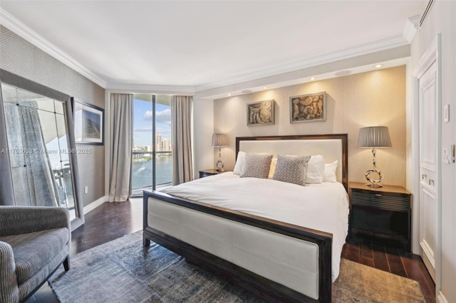 bedroom with access to outside, crown molding, a water view, and dark hardwood / wood-style floors