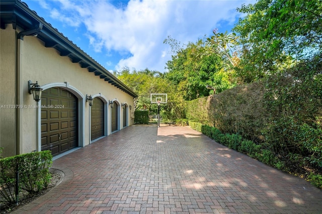 view of patio / terrace with a garage