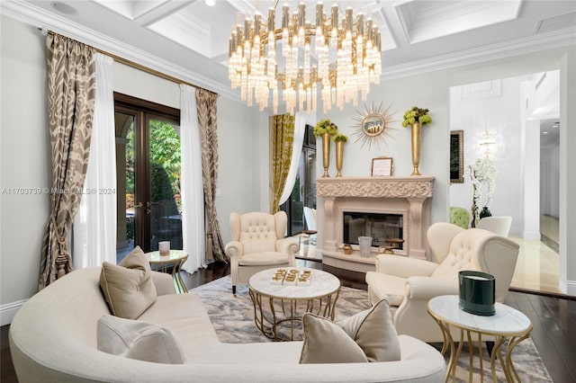 living area featuring crown molding, hardwood / wood-style floors, a chandelier, and coffered ceiling