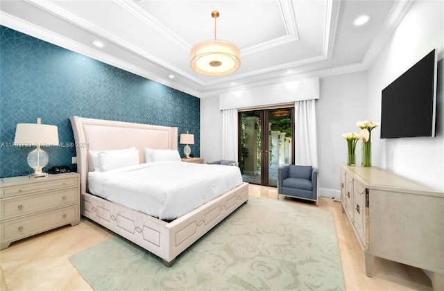 bedroom featuring access to outside, a tray ceiling, and ornamental molding