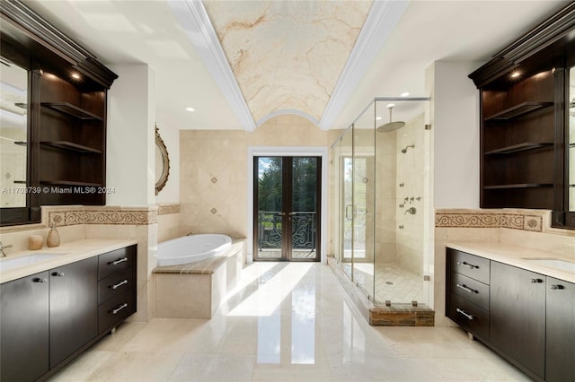 bathroom featuring shower with separate bathtub, tile walls, and crown molding