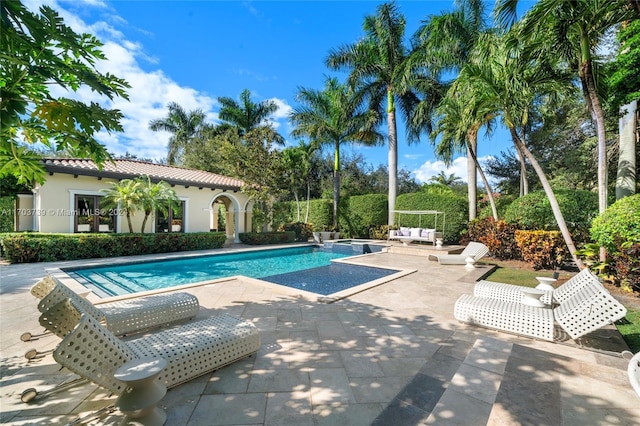 5935 Moss Ranch Rd, Pinecrest, FL 33156 - view of pool featuring a patio area and a pool with connected hot tub
