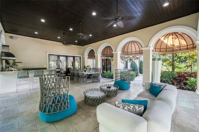 view of patio / terrace featuring an outdoor living space and ceiling fan