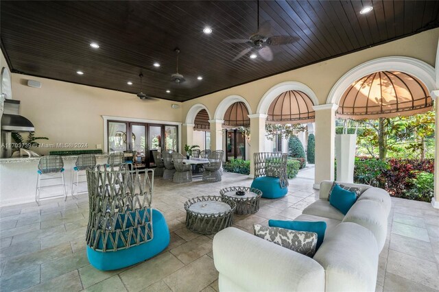 5935 Moss Ranch Rd, Pinecrest, FL 33156 - view of patio with french doors, outdoor lounge area, ceiling fan, and outdoor dining space